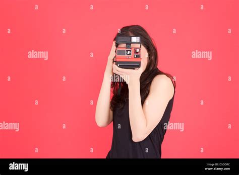 Woman Photographer With Polaroid Camera Stock Photo Alamy