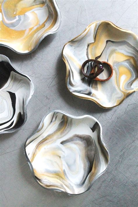 A few weeks ago lucy and i had our first experience marbling paper.we both were so enthralled with the activity that we ended up. DIY Marbled Clay Ring Dish | Baking clay, Diy clay rings, Ring dish
