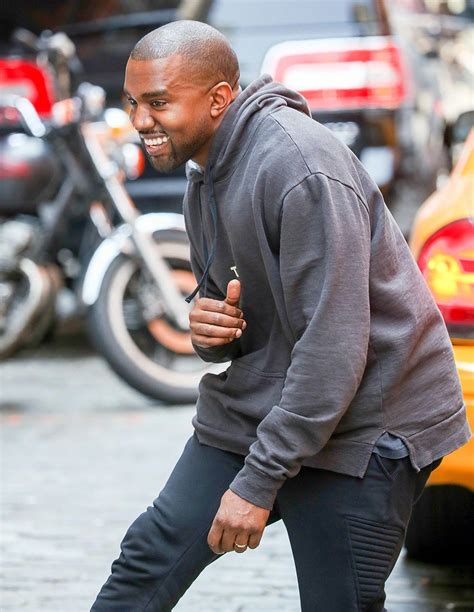 Kanye West Spotted With A Rare Smile On His Face Mirror Online