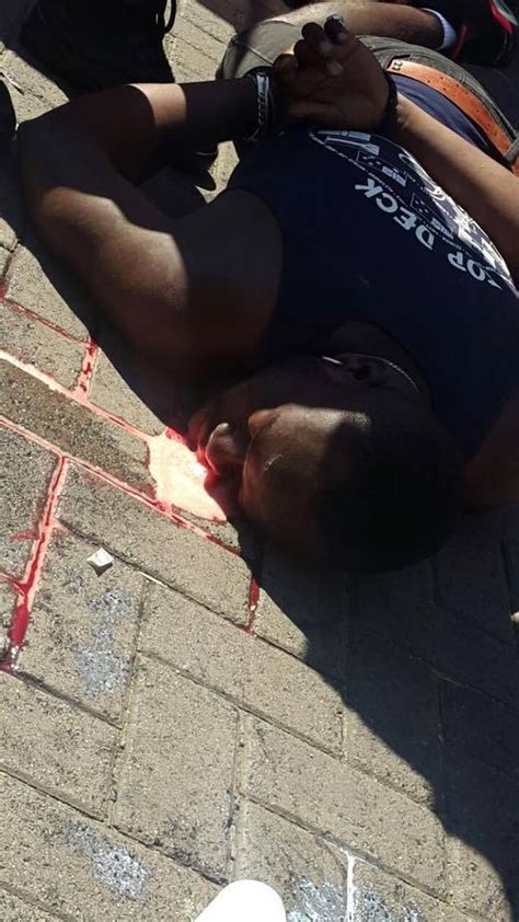 South africa flag, the don`t cross the line mark and the location tape. Nigerian Man Killed For Selling Drugs In South Africa ...