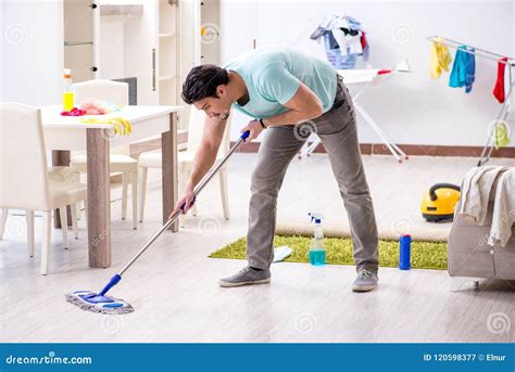 Man Cleaning House From Mess Stock Image Image Of Contractor