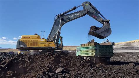 Volvo Ec700b Excavator Loading Coal On Trucks Youtube