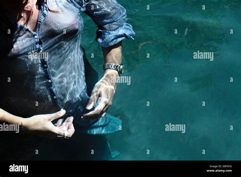 Fully Clothed In Water Hi Res Stock Photography And Images Alamy