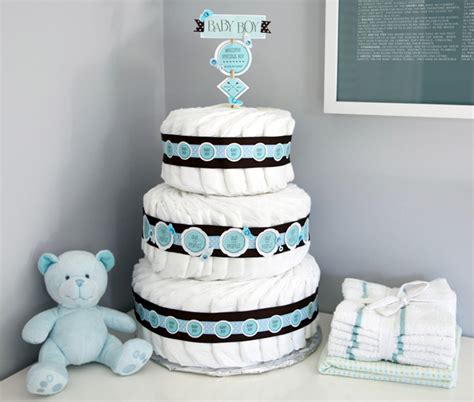 I personally would prefer a snickers poke cake at my baby shower but diaper cakes are definitely cuter. 14 Cutest DIY Baby Shower Decorations To Try - Shelterness