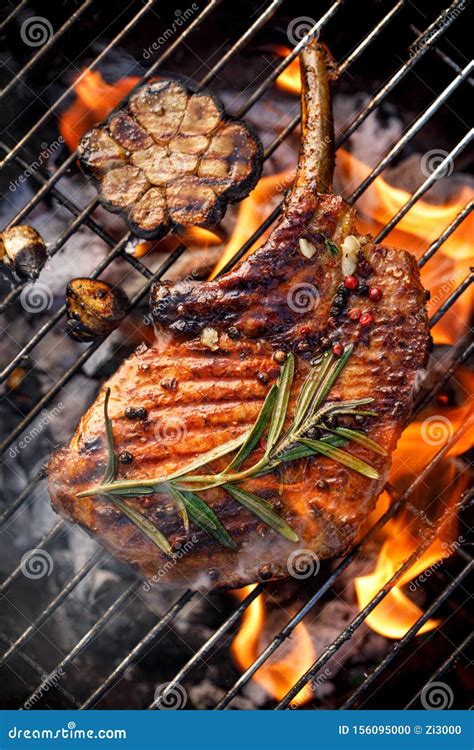 Grilled Bone In Pork Chop Pork Steak Tomahawk In A Rosemary Garlic Hot Sex Picture