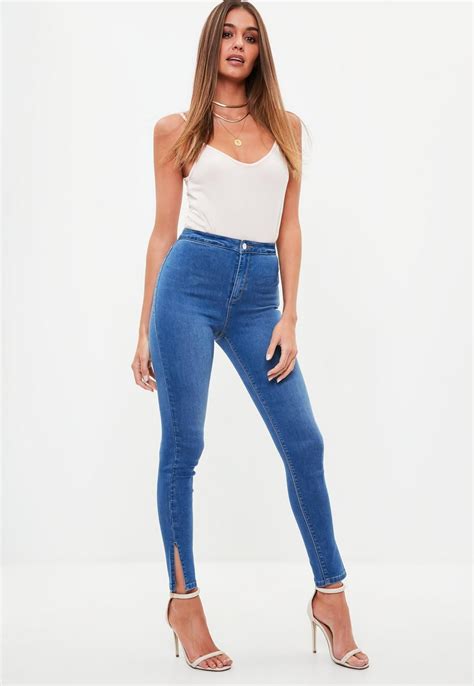 High Waisted Skinny Jeans Featuring In A Blue Hue With Split Hem And