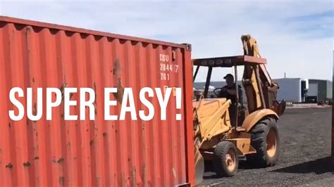 Moving Shipping Containers Around With A Backhoe Youtube