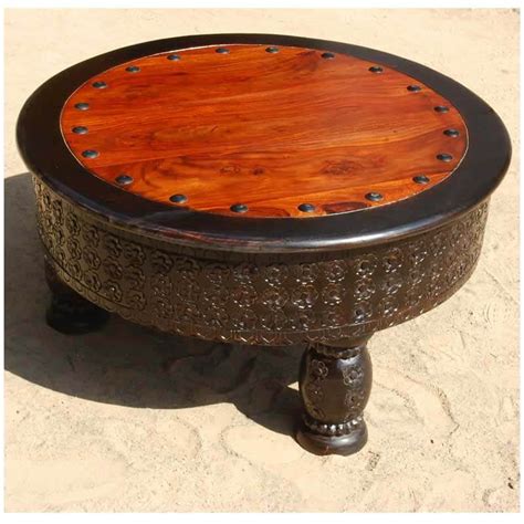 Marry with organic textures such as vintage leather, linen or hide. Rustic Solid Wood Hand Carved Round Coffee Table