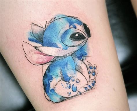 A new and increasingly trendy tattoo design, this quirky style has become quite the craze among tattoo lovers. Watercolour Stitch | Disney tattoos, Stitch tattoo, Drawings
