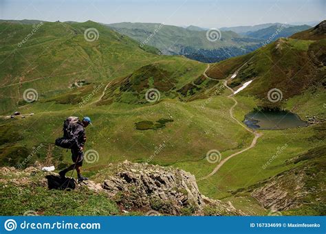 Wanderer Goes Down The Hill To Pond Stock Image Image Of Hike