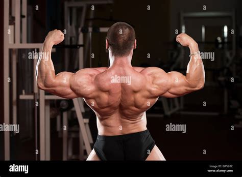 Bodybuilder Performing Rear Double Biceps Poses Stock Photo Alamy