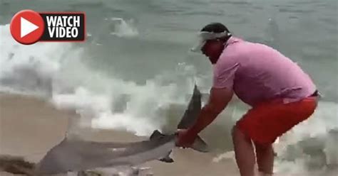Calmest Fisherman On The Planet Casually Drags Shark By Its Tail Into
