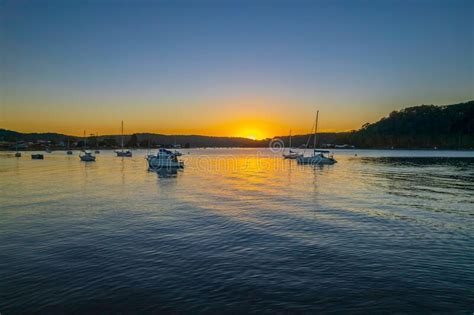 Aerial Sunrise Waterscape With Boats And Clear Skies Stock Photo