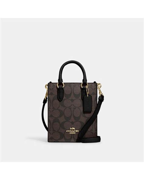 Coach Outlet North South Mini Tote In Signature Canvas In Black Lyst