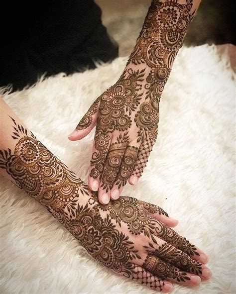 Image May Contain One Or More People And Closeup Mehndi Designs For