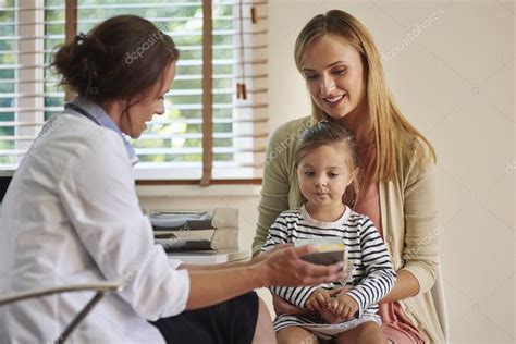 Mother And Daughter Visit A Doctor Stock Photo By ©gpointstudio 88292526