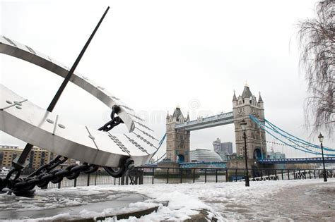Tower Bridge And Tower Hill Dial In The Snow London Uk Stock Image
