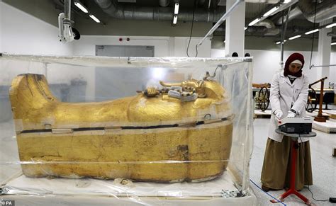 tutankhamun s gold gilded sarcophagus leaves the pharaoh s tomb for the first time in 97 years