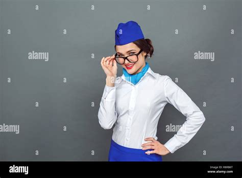 Professional Occupation Stewardess In Glasses Standing Isolated On