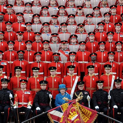 The Queen Presents The Grenadier Guards With New Colours In The Gardens