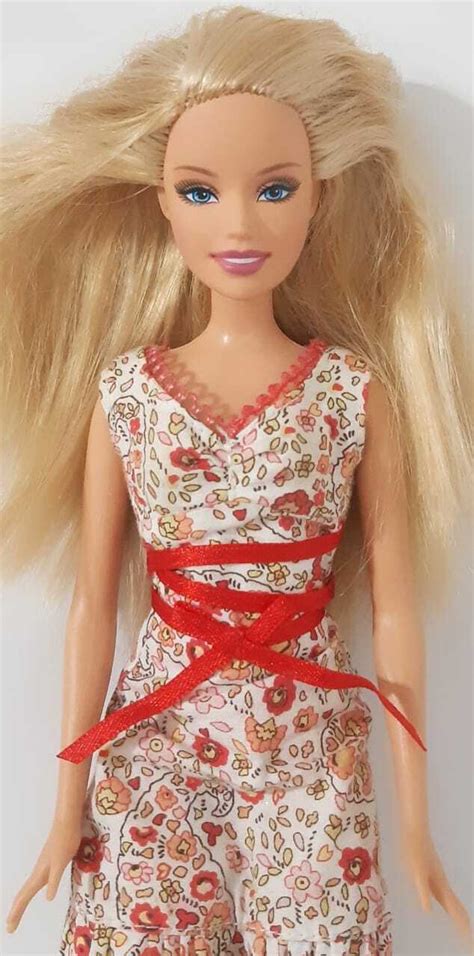 Mattel Barbie Doll Blonde Hair Blue Eyes Bendable Knees With