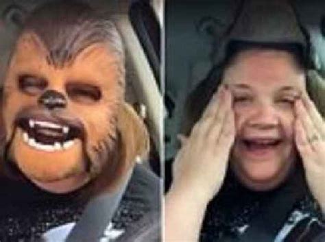 hilarious facebook video of mom laughing uncontrollably with chewbacca mask on one news page [uk]