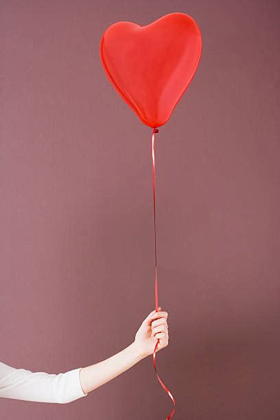 Top 60 Hand Holding Balloon Stock Photos Pictures And Images Istock