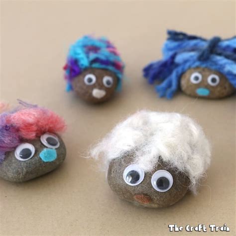 Create Adorable Fluffy Pet Rocks With Pom Pom Trimmings This Is A