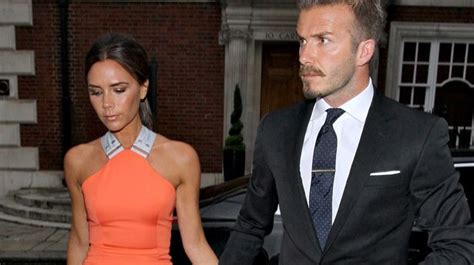 Victoria Beckham Wears Bright Orange Dress To Go To Simon Fullers Party With David Mirror Online