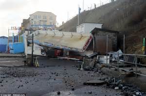 Norfolk beach-side homes destroyed by worst storm surge for SIXTY years