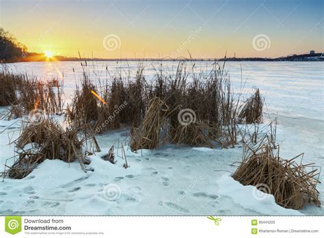 Beautiful Winter Landscape With Frozen Lake And Sunset Sky Stock Image