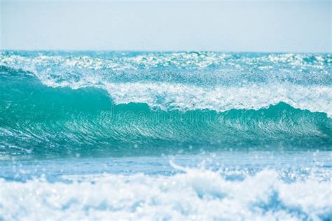Blue Wave In Tropical Ocean Wave Barrel Crashing And Sun Light Stock