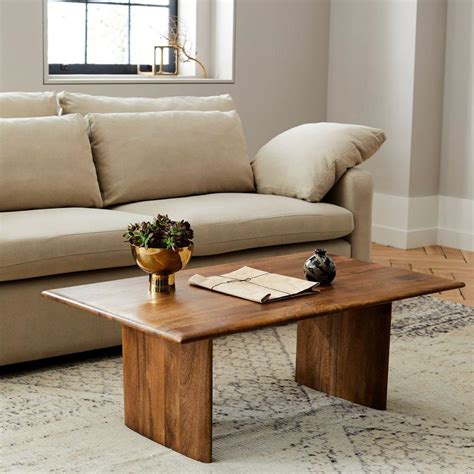 Coffee tables with storage come in all different guises. Anton Solid Wood Coffee Table - Rectangle | west elm UK