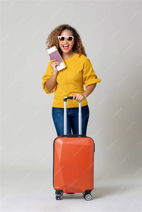 Premium Photo African American Woman Tourist With Luggage