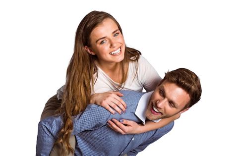 Premium Photo Smiling Young Man Carrying Woman