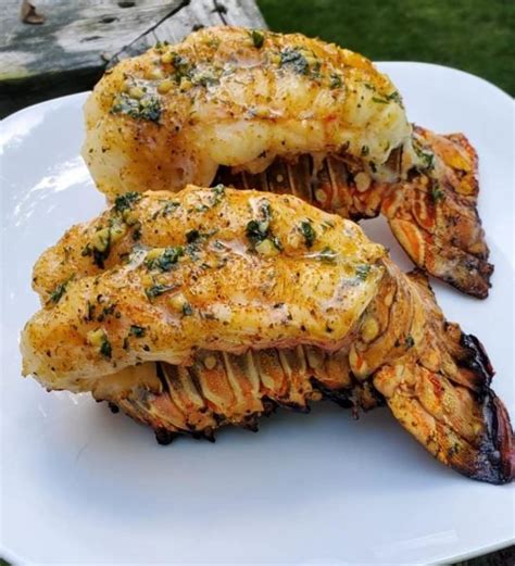 grilled lobster tail basted with a garlic lemon butter sauce