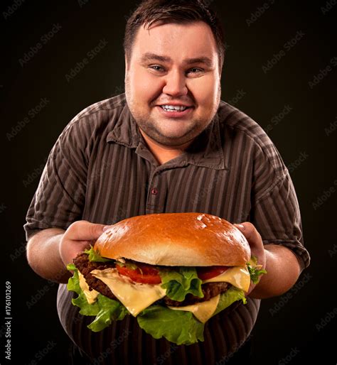 Man Eating Fast Food Hamberger Fat Person Made Great Huge Hamburger And Admires Him Intending
