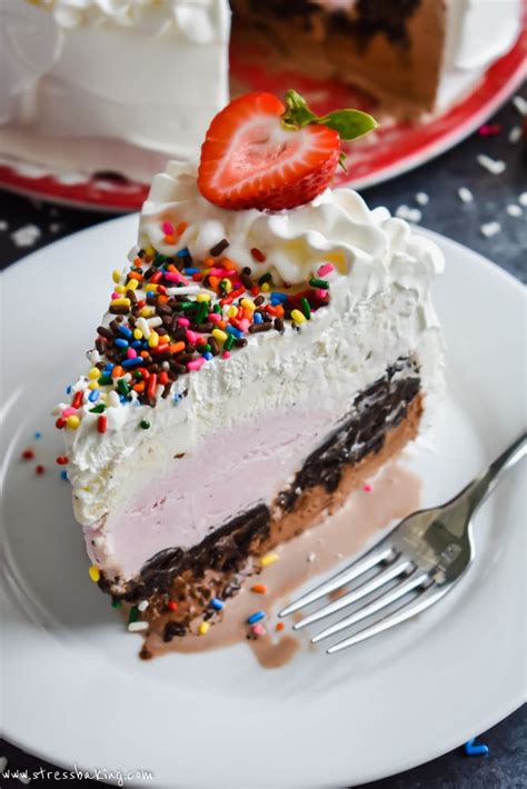 An Easy Neapolitan Ice Cream Cake With Creamy Layers Of Chocolate Vanilla And Strawberry Ice