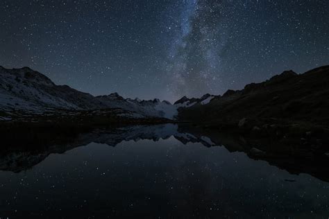 Reflections Of The Night Sky By Microsoft Wallpapers Wallpaperhub