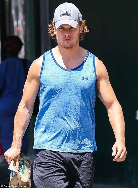 Sam Heughan Shows Off His Bulging Biceps In Vest After Trip To Gym In