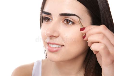 Young Woman Plucking Eyebrows With Tweezers Stock Image Image Of Beautician Correction 115888587