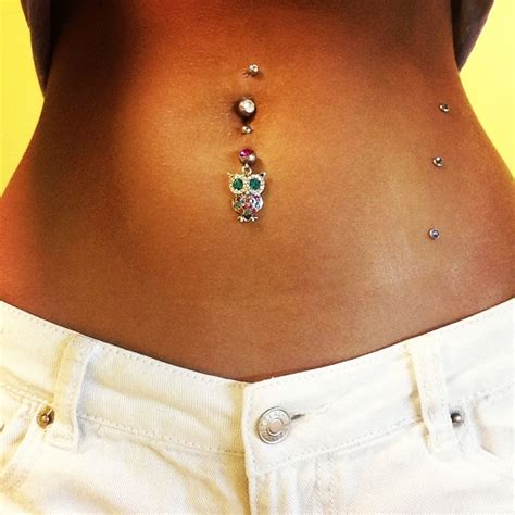 Side Dermals And Double Navel Piercing Double Navel Piercing Belly