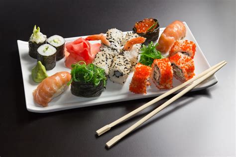 Assorted Sushi On White Ceramic Plate With Chopsticks Hd Wallpaper