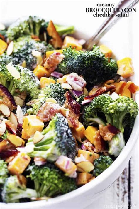 Roasted broccoli has a unique flavor that makes this salad simple and there's a double magic when bacon is mixed in. Creamy Broccoli Bacon and Cheddar Salad | The Recipe Critic