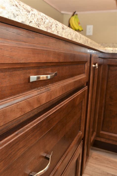 There are no identifiable marks or numbers on this piece. Haas Cabinetry Lancaster Square Hickory Sienna Laminate Milano Quartz color | Hickory cabinets ...