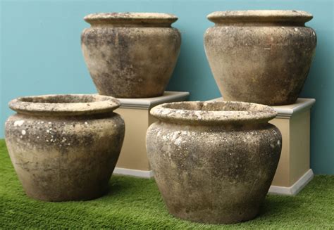 A Set Of Four Reclaimed Weathered Stone Planters Uk Architectural
