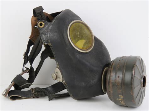 An Early Wwii German Leather Gas Mask With Filter