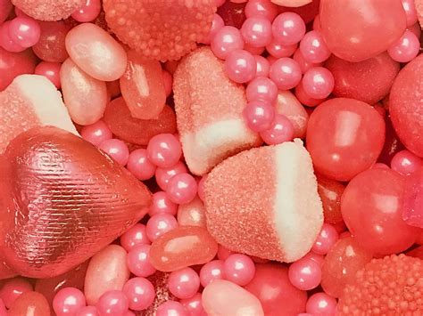 Download An Alluring Display Of Pink Candies Wallpaper