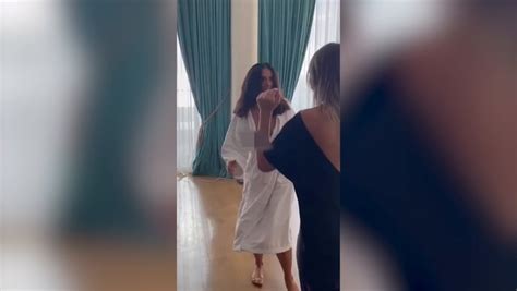 Salma Hayek Suffers Major Wardrobe Malfunction As She Dances In A Gaping Robe For Fans Mirror