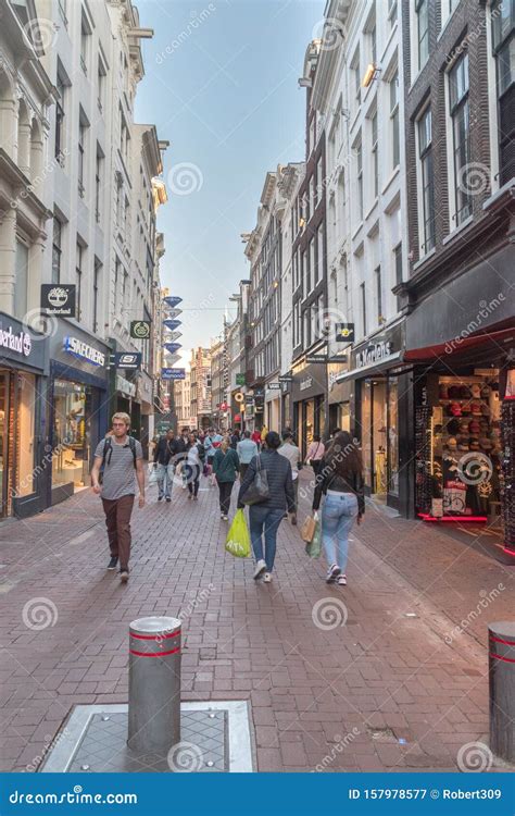 People On Kalverstraat Street Kalverstraat Is A Busy Shopping Street